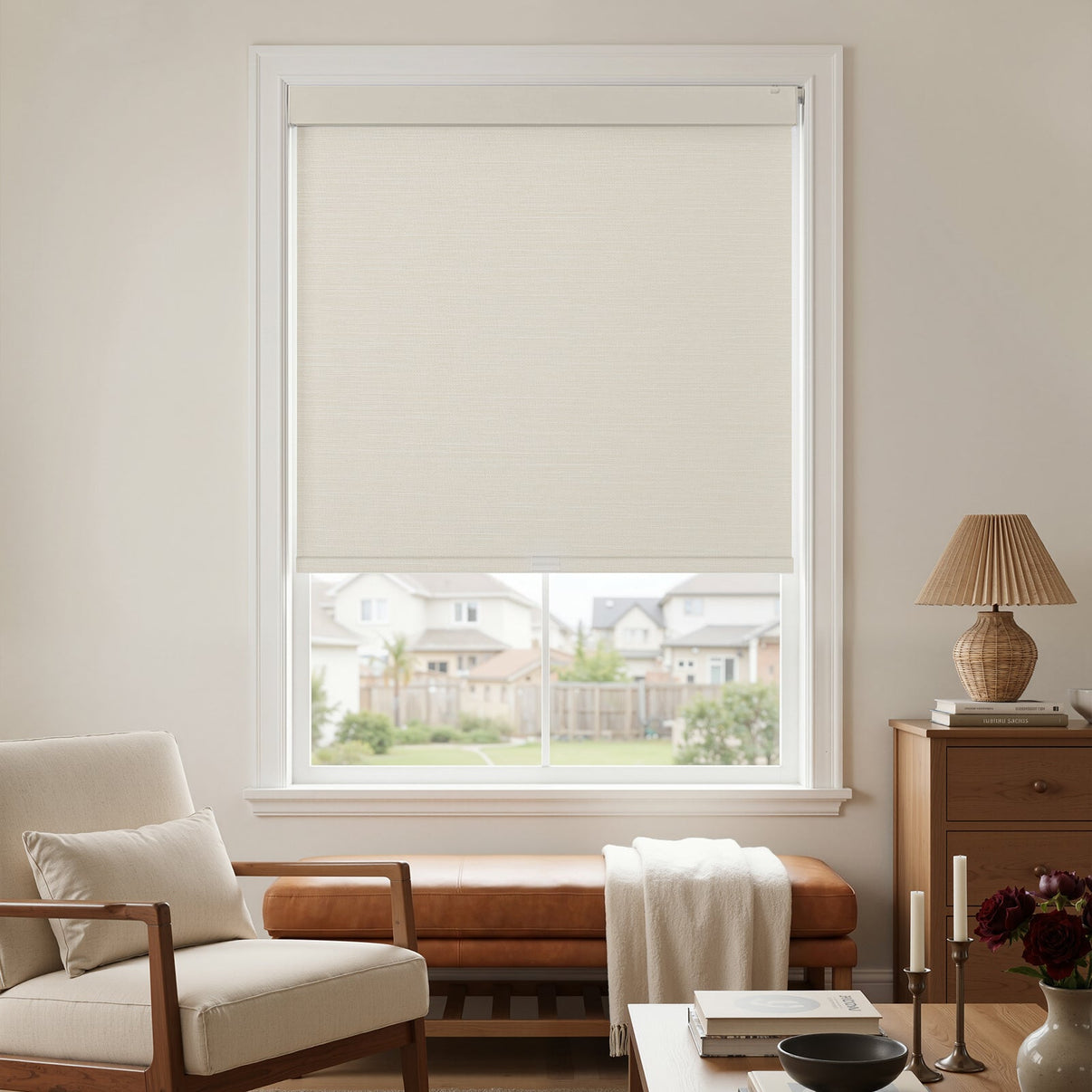 Beige plain weave blackout roller shade with no-drill installation.