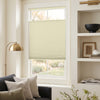 Cream no-drill top-down bottom-up blackout cellular shade, honeycomb design.