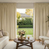 Haven Linen Blend custom blackout curtains in beige, featuring soft pleats and textured fabric.