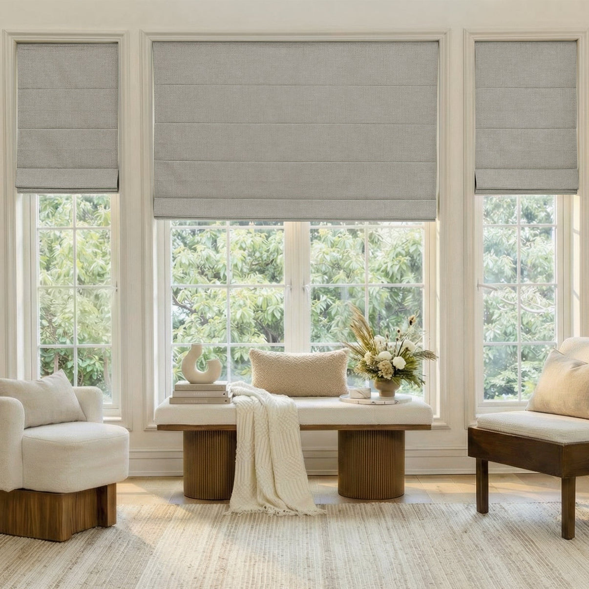 Grey faux linen blackout Roman shade with tailored folds, ideal custom window treatment.